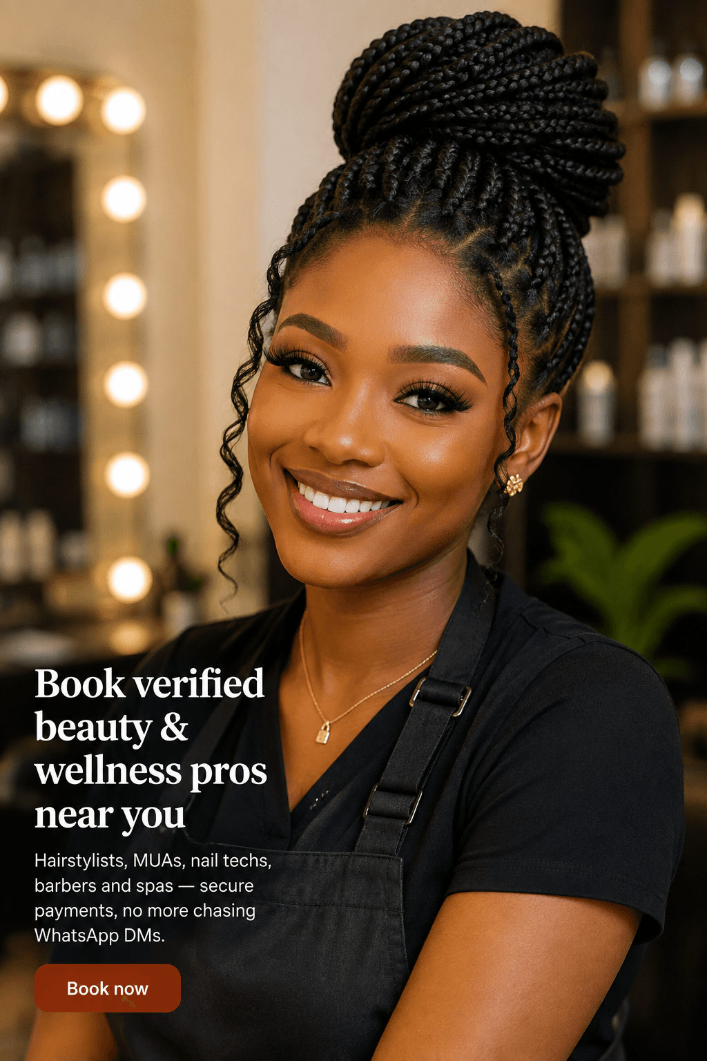 A beauty professional with an elegant braided updo